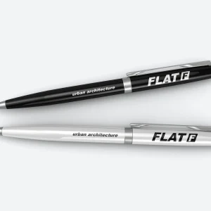 gri zemin uzerinde iki adet metal kalem